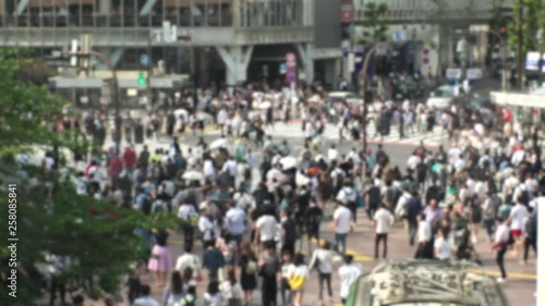 Wallpaper Mural TOKYO, JAPAN - CIRCA MARCH 2019 : QR CODE look alike black and white pattern (CAN NOT SCAN THIS) to scan via smartphone.  SHIBUYA SCRAMBLE CROSSING background. Torontodigital.ca