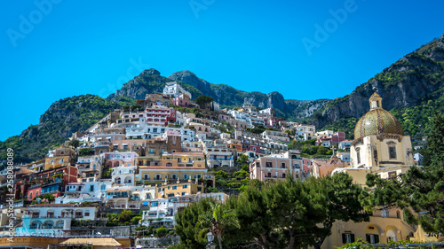 Panorama of beautiful coastal town - Positano by Amalfi Coast in Italy during summer's daylight, Positano, Italy © Bogusz