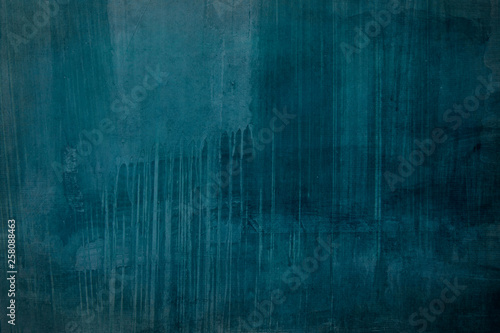 Dark blue grungy distressed canvas bacground
