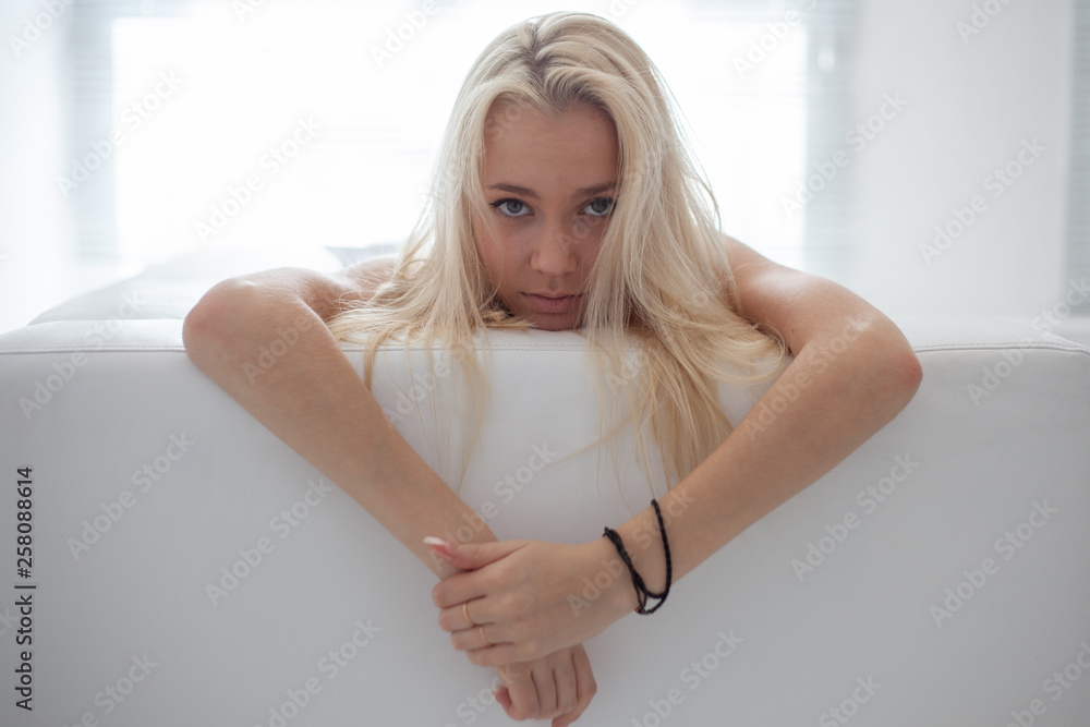 Amazing blond girl posing for photo in loft photo studio Amazing blond girl posing for photo in loft photo studio