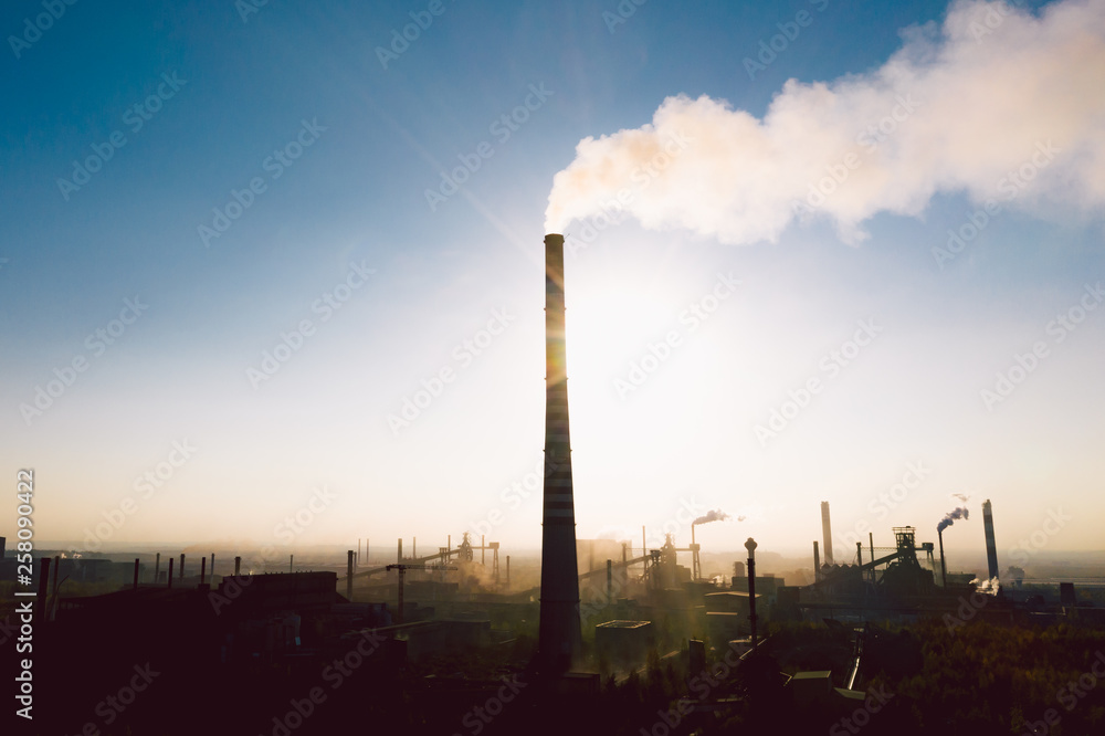 industrial landscape with heavy pollution produced by a large factory industrial landscape with heavy pollution produced by a large factory