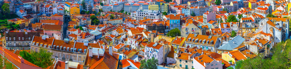 Summertime sunshine day cityscape panoramic view of historic old centre in Lisbon, Portugal.