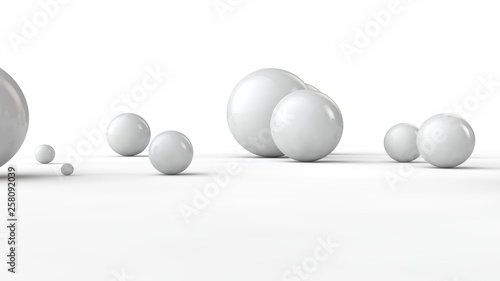 3D illustration of balls of different sizes on a white surface. The idea of order  chaos and abstraction. Comparative image of the geometry of space. 3D rendering isolated on white background.