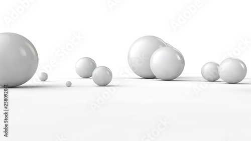 3D illustration of balls of different sizes on a white surface. The idea of order, chaos and abstraction. Comparative image of the geometry of space. 3D rendering isolated on white background.