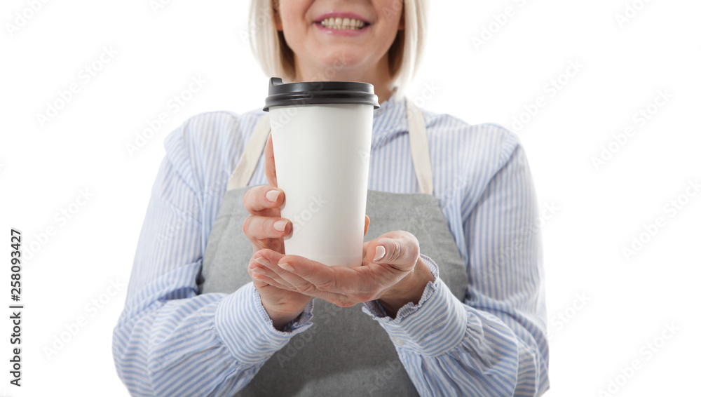 Part-time job coffee break relax leisure pause concept. Friendly pleasant woman barista giving big latte isolated on gray background copy-space Part-time job coffee break relax leisure pause concept. Friendly pleasant woman barista giving big latte isolated on gray background copy-space