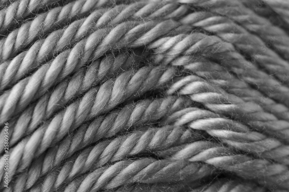 Close up of gray rope like texture of synthethic fibre ball of wool Close up of gray rope like texture of synthethic fibre ball of wool