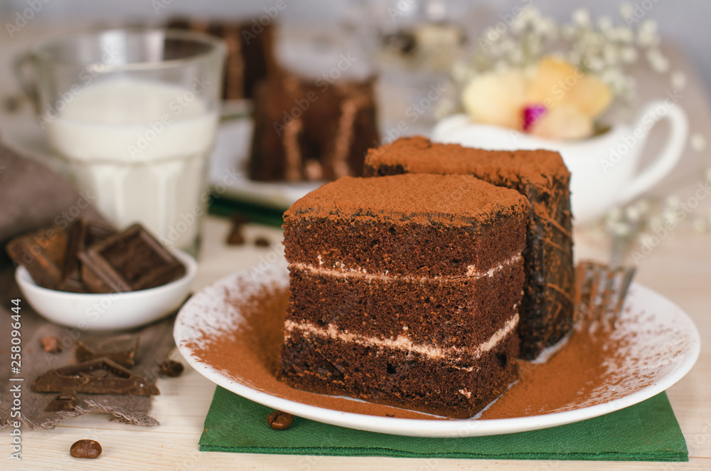 Still life on the table. Sweet cake and a hot drink . chocolate cake . Still life on the table. Sweet cake and a hot drink . chocolate cake .