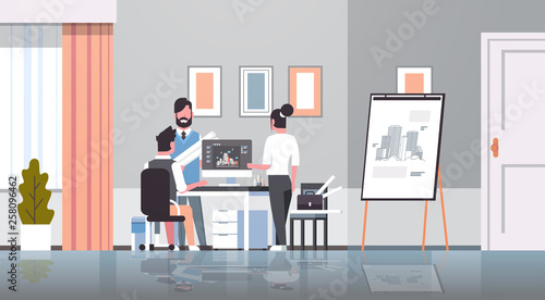 team architect engineers drawing blueprint urban building plan on computer panning design project concept office draftsman studio interior horizontal full length