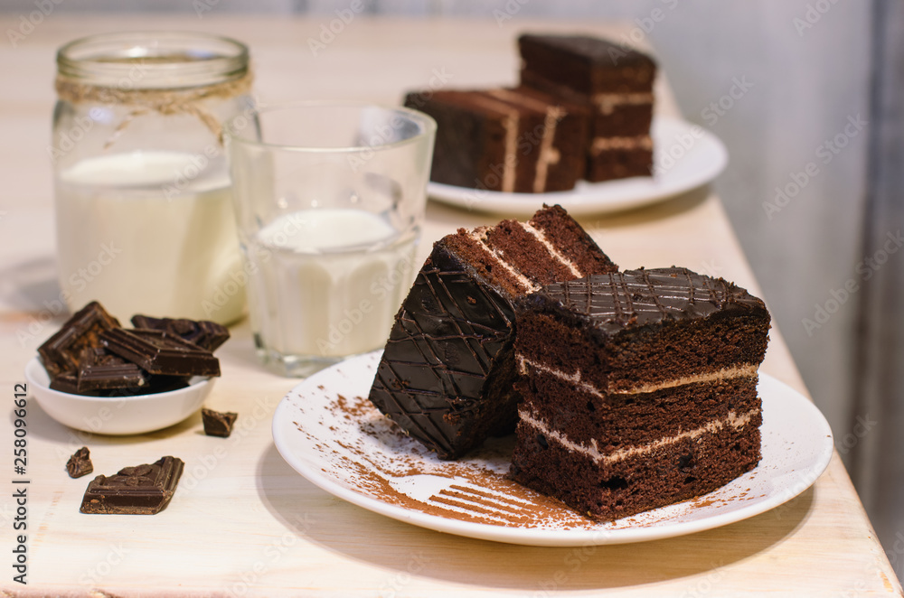 Still life on the table. Sweet cake and a hot drink . chocolate cake . Still life on the table. Sweet cake and a hot drink . chocolate cake .