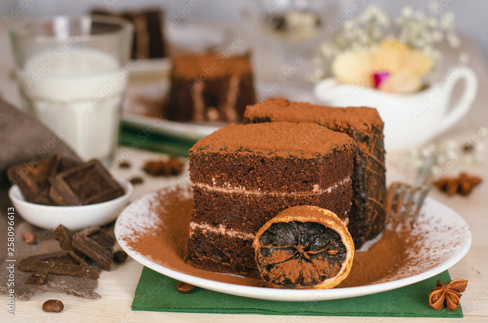 Still life on the table. Sweet cake and a hot drink . chocolate cake . Still life on the table. Sweet cake and a hot drink . chocolate cake .