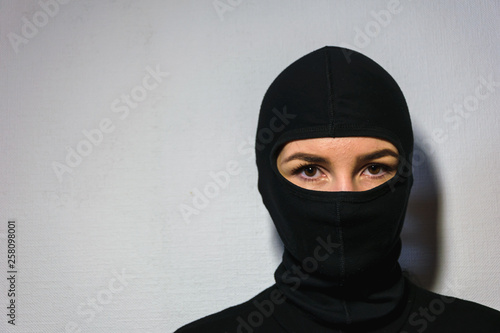 girl in a police mask