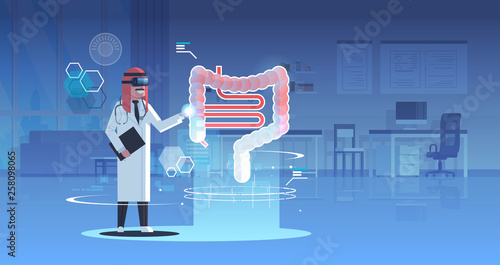 arab doctor wearing digital glasses looking virtual reality human digestive system organ anatomy healthcare medical vr headset vision concept hospital office interior full length horizontal