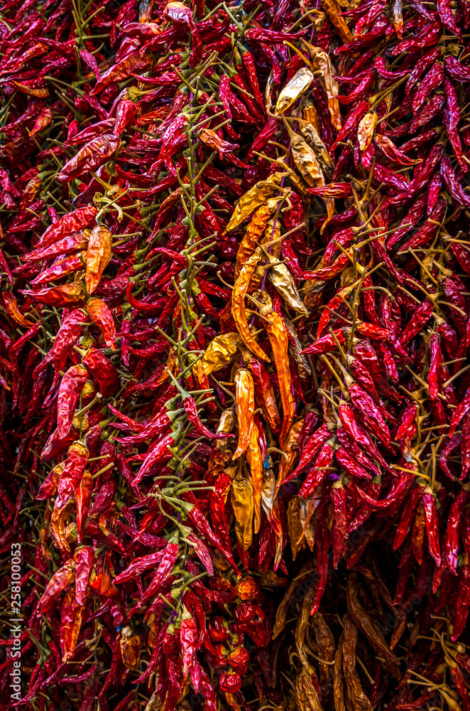 Fototapeta premium Colorful dried chilli peppers at the Italian bazaar