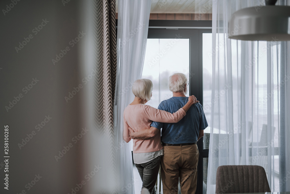 Back side pensioner couple enjoying time together Back side pensioner couple enjoying time together
