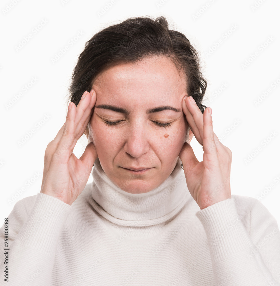  Healthcare, stress and headache concept. Stressedl woman touching temples over white background