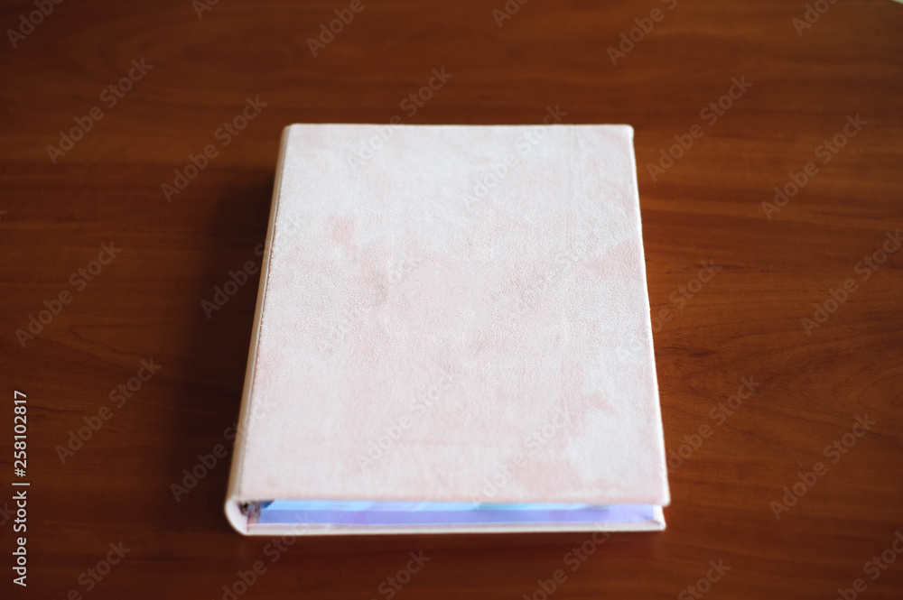 Fototapeta premium Invitations, notepad, handmade notebook on the wooden table.