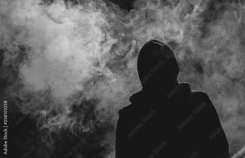 silhouette of a guy in the smoke silhouette of a guy in the smoke