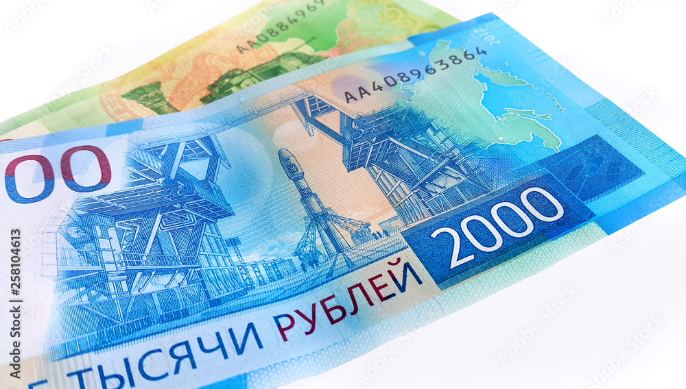 New Russian money, close-up, isolated on white background New Russian money, close-up, isolated on white background