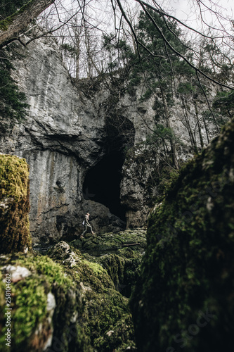 Woman explores the cave system Rakov Skocjan in Slovenia