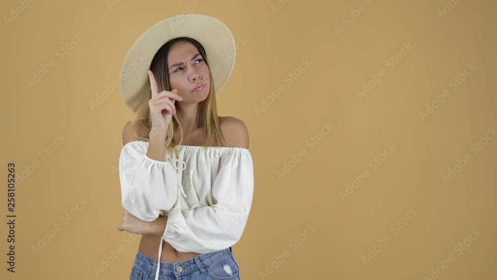 attractive young blonde in white blouse and straw hat posing on the background, attractive young blonde in white blouse and straw hat posing on the background,