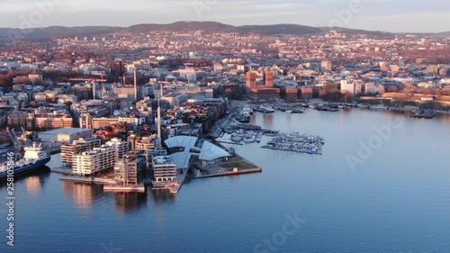 Aerial real time slow POI shot of Aker Brygge and Filipstad seen towards Akershus and Bjorvika in Oslo, Norway in spring 2019 photo