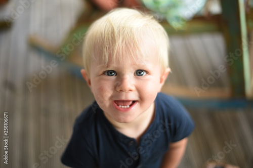 smiling blond child in close-up