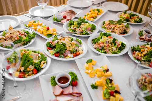 Appetizers and salads on the banquet table