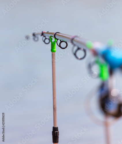 Stand for fishing rods on the beach © schankz