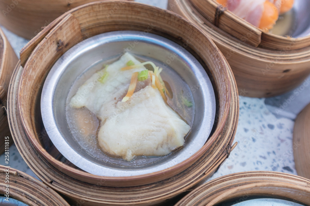 close up of variety dim sum in bamboo basket close up of variety dim sum in bamboo basket