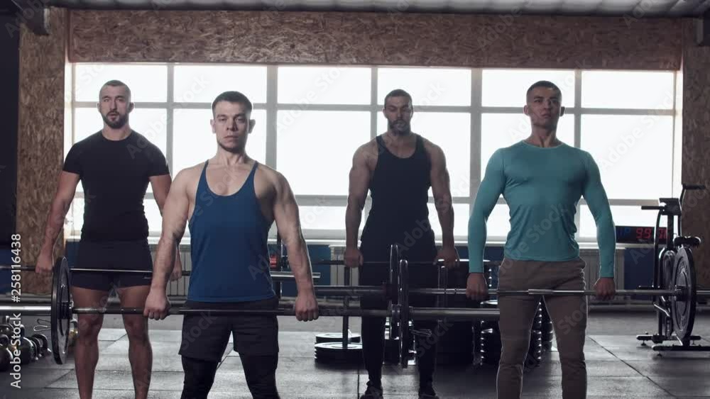 Sportive Friends Working Out in Gym Sportive Friends Working Out in Gym