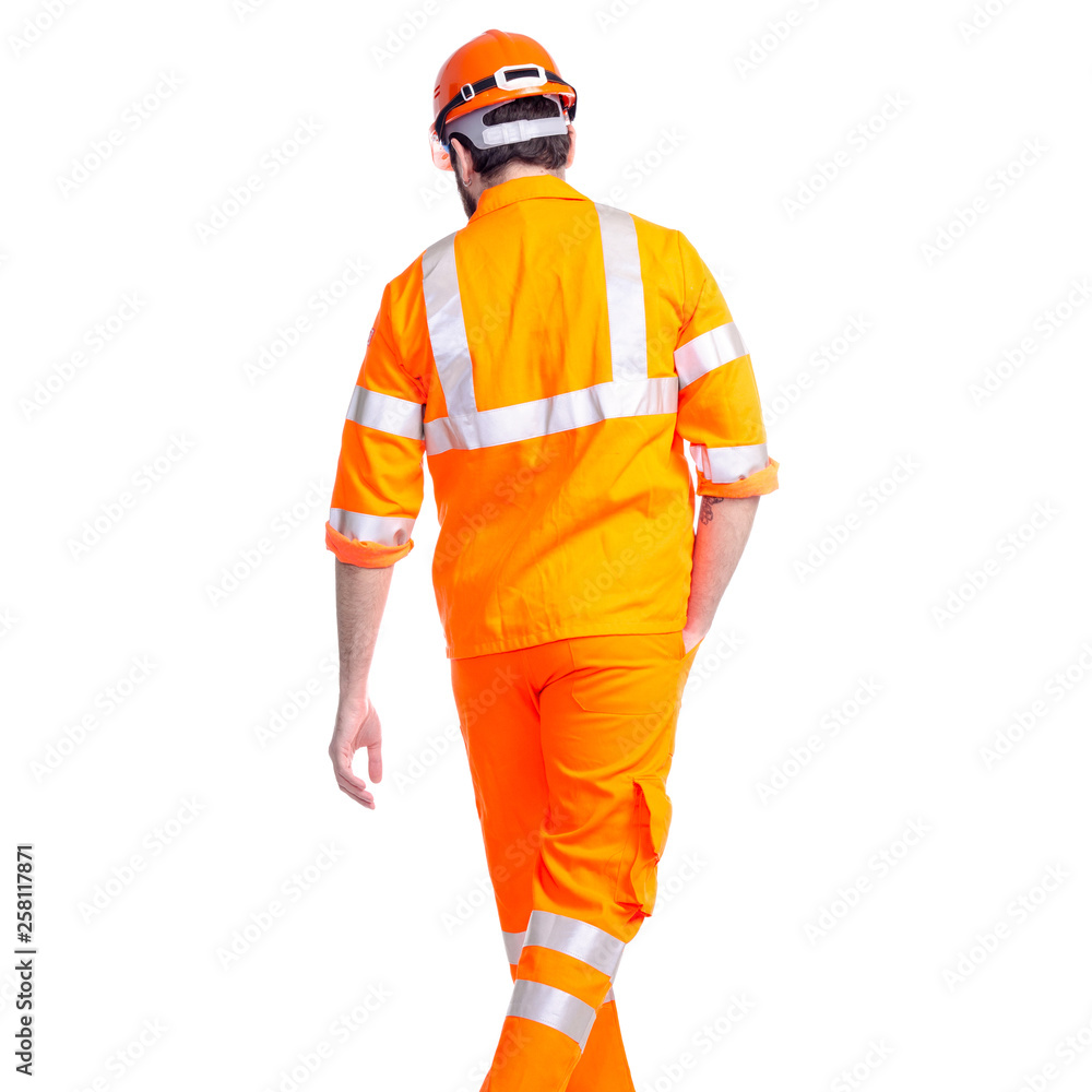Man worker road constructor goes walking on white background isolation, back view Man worker road constructor goes walking on white background isolation, back view