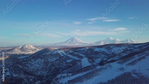 Aerial view of Kamchatka biggest city of Petropavlosk, volcanos and city photo