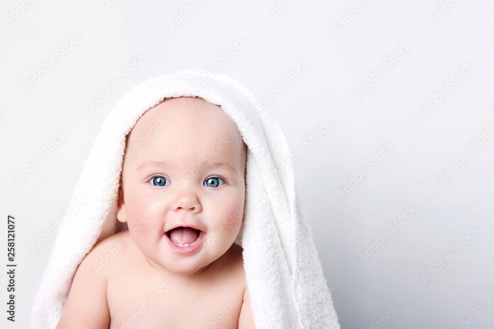 Baby child portrait in towel empty space background. Baby child portrait in towel empty space background.
