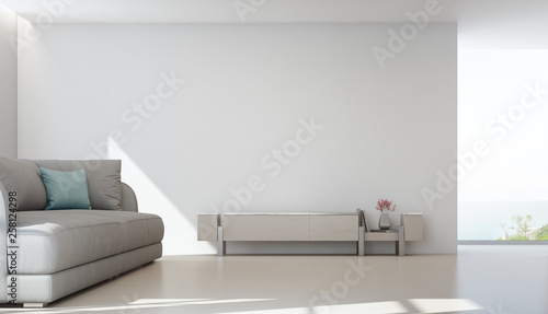 Sea view living room of luxury summer beach house with TV stand and wooden cabinet near big sofa. Empty white wall background in vacation home or holiday villa. Hotel interior 3d illustration.