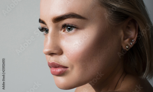 Fotografia, Obraz Closeup portrait of a young girl with long eyelashes