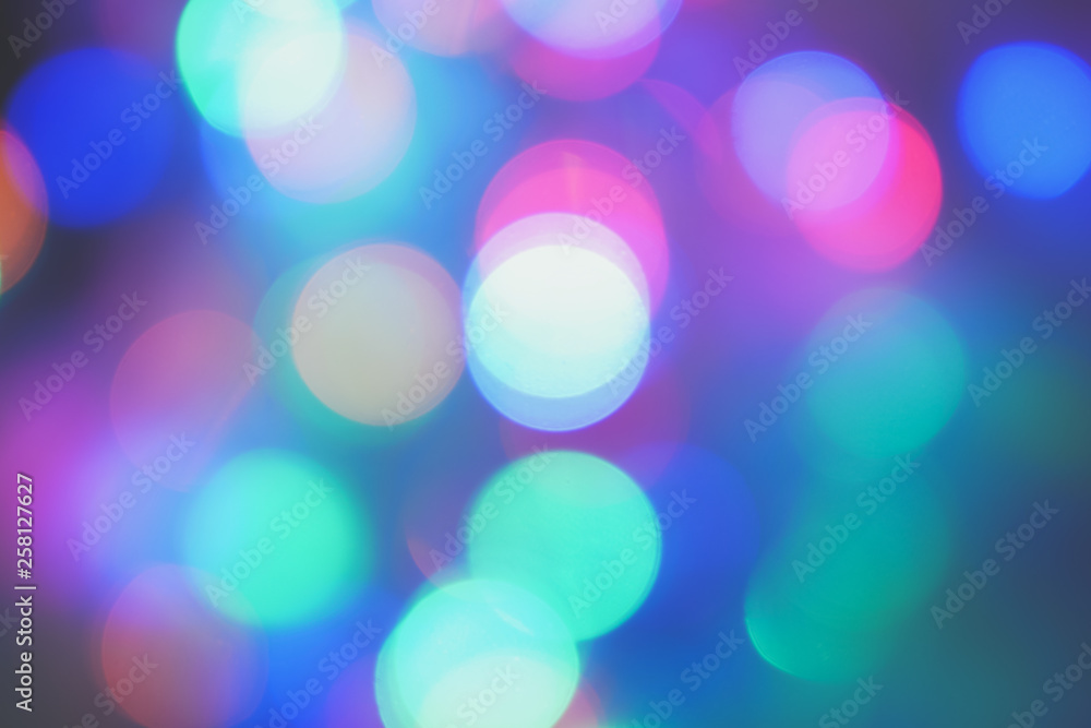 Fototapeta premium blue purple pink night city lights bokeh background,lights blurred bokeh background for your design