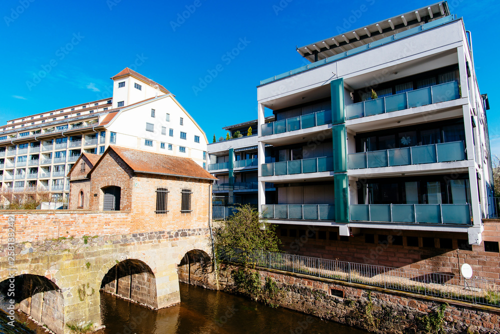 Landau, Germany - 28th of march 2019: New buildings for Living on the River Queich in Landau/ Palatinate Landau, Germany - 28th of march 2019: New buildings for Living on the River Queich in Landau/ Palatinate