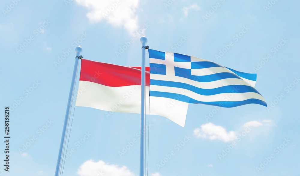 Greece and Indonesia, two flags waving against blue sky. 3d image