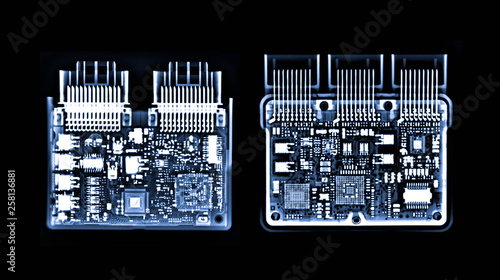 X-ray image of couple engine control unit or ECU in Motorcycle is a type of electronic control two and three slot. photo