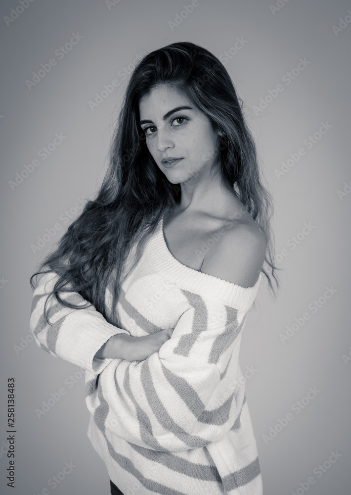 Portrait of an attractive girl with happy and smiling face. In beauty, model and fashion concept Portrait of an attractive girl with happy and smiling face. In beauty, model and fashion concept
