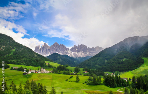 Alpine landscape with Santa Maddalena Alta and The Dolomites Mountains