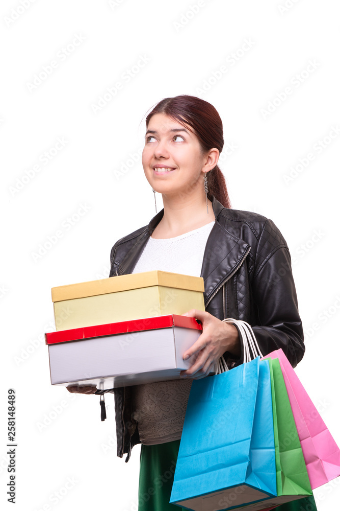 Happy young woman with shopping bags and boxes Happy young woman with shopping bags and boxes