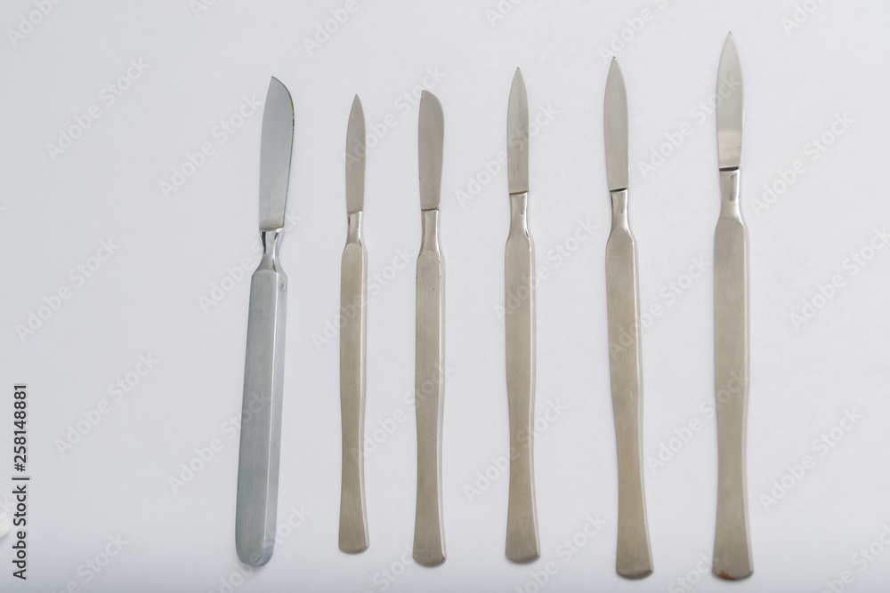Different One-Piece Scalpels on white background Different One-Piece Scalpels on white background