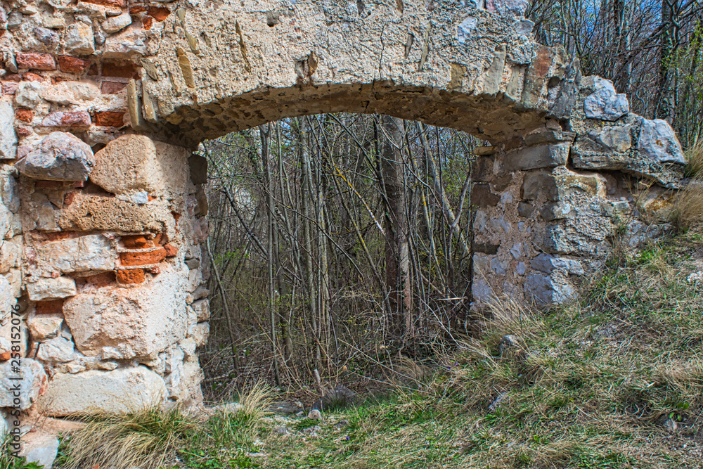 a small ruin window made of stones