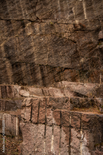 Stone wall surface  natural colors gray and brown. Abstract background