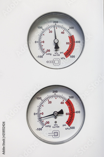 two barometers indicate the pressure