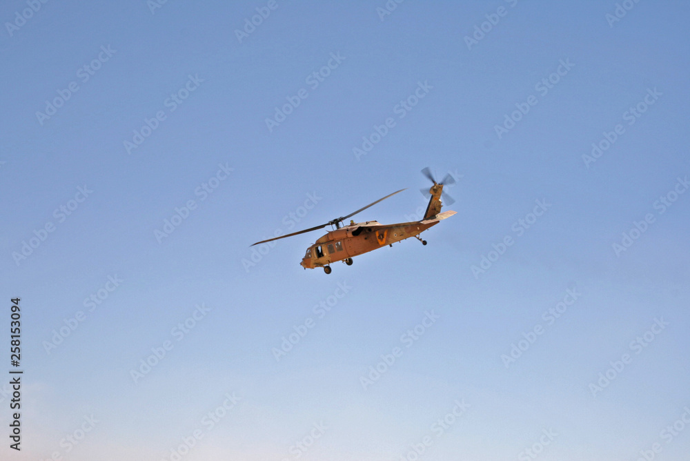 Fototapeta premium Military Rescue Helicopter in Rescue mission