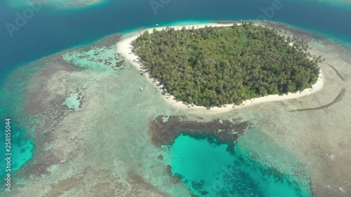 Aerial: flying over desert islands coral reef tropical caribbean sea, turquoise blue water. Indonesia Sumatra Banyak islands. travel destination diving snorkeling. Native cinelike D-log color profile photo