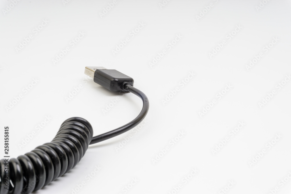 Universal recharger head isolated on white background. Selective focus and crop fragment Universal recharger head isolated on white background. Selective focus and crop fragment
