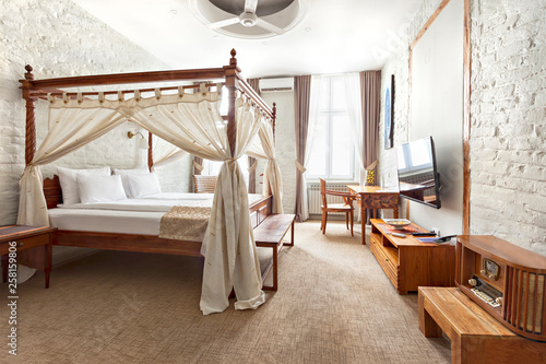 Принти на полотні Luxurious modern bedroom interior with canopy bed